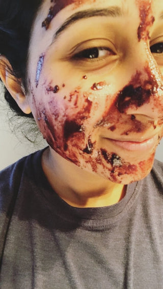 Woman with face mask treatment
