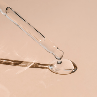 Niacinamide serum droplet from dropper