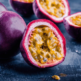 Passion fruit, seed oil source, cut open to show seeds