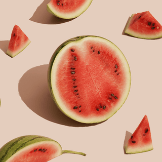 Watermelon fruit slices and whole cut watermelon