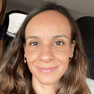 Photo of a woman's brightened and glowing complexion after use of Apoterra's clean skincare products