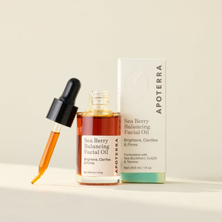 Apoterra Sea Berry Balancing Facial Oil main product image with box for brightening, clearing, and firming skin
