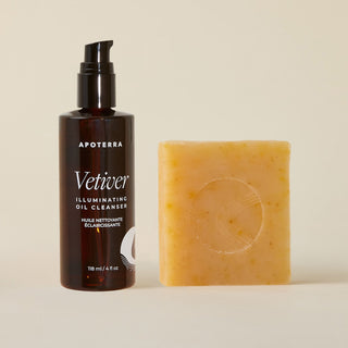 Apoterra Vetiver Illuminating Oil Cleanser bottle and Pumpkin & Wild Carrot Cleanser soap bar hero image