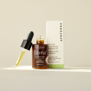Apoterra Herbal Clarifying Facial Oil clears breakouts, purifies & renews skin. Formulated with green tea, grapeseed, and immortelle. 