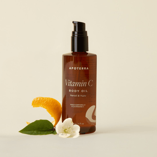 Neroli and Yuzu Vitamin C Body Oil by Apoterra main image with neroli flowers and citrus peel
