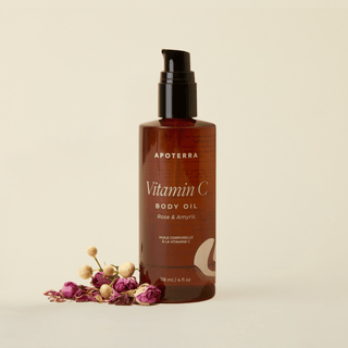 Apoterra Rose and Amyris Vitamin C Body Oil by Apoterra main product image featuring amber body oil bottle with rose flowers