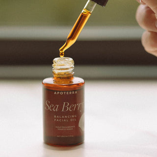 Apoterra Sea Berry Balancing Facial Oil bottle and dropper lifestyle image