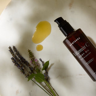 Vitamin C Body Oil with Lavender and Tulsi essential oils texture lifestyle photo